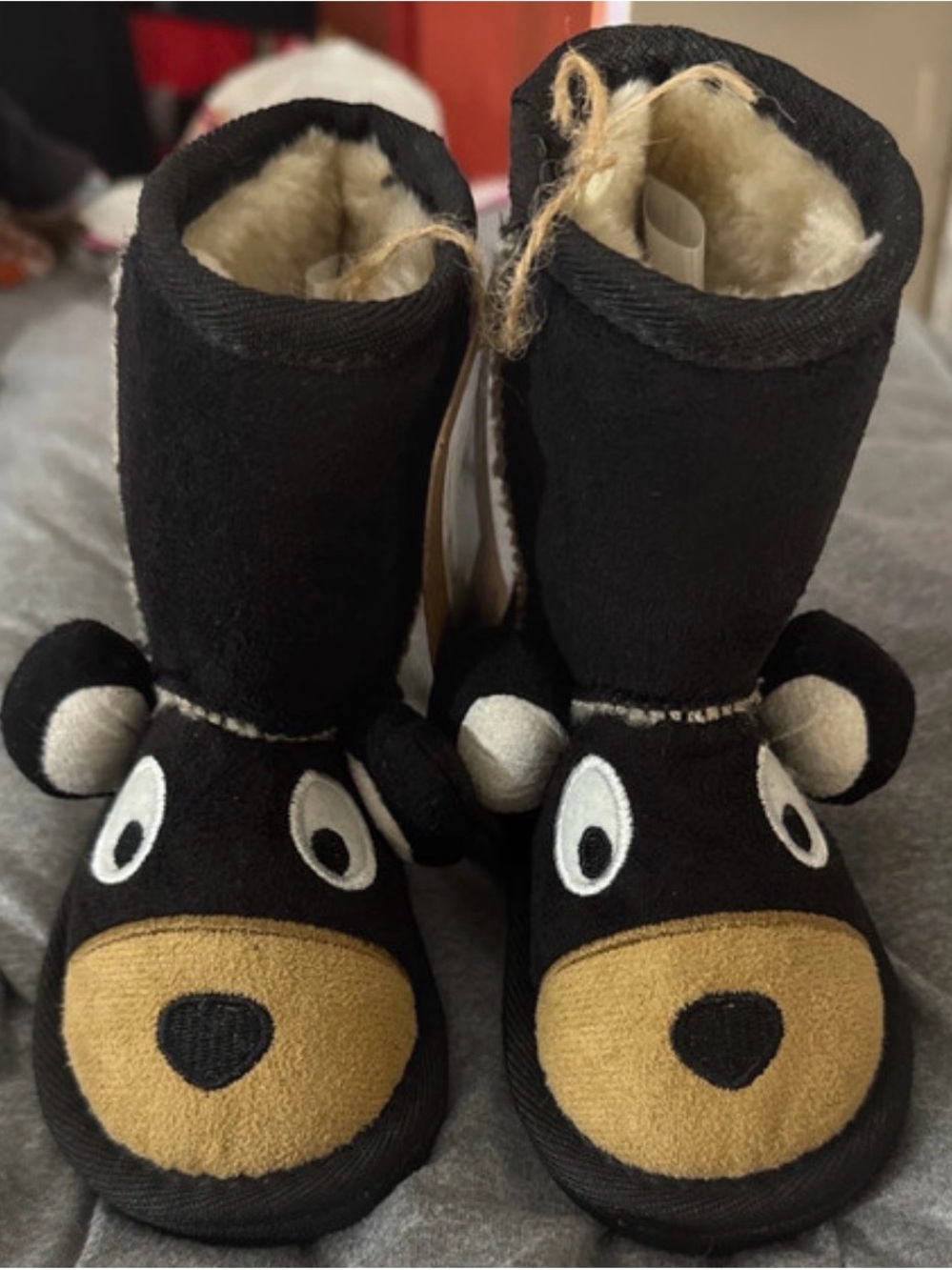 Lazy One Black Plush Boot Slippers with Tan Stitching